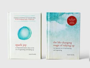 Cover of Marie Kondo's books "Spark Joy" and the "The Life Changing Magic of Tidying Up"